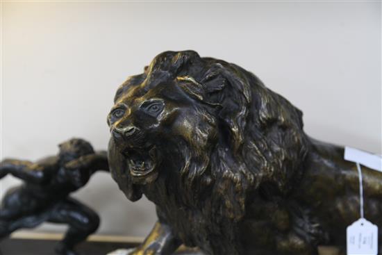 Thomas Cartier. A bronze figure of a roaring lion, width 24in. height 17in.
